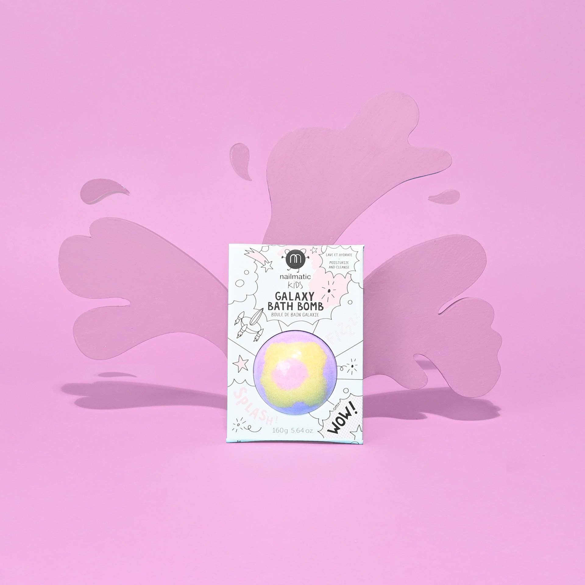 Bath bomb packaging with a colorful bath bomb on a pink background