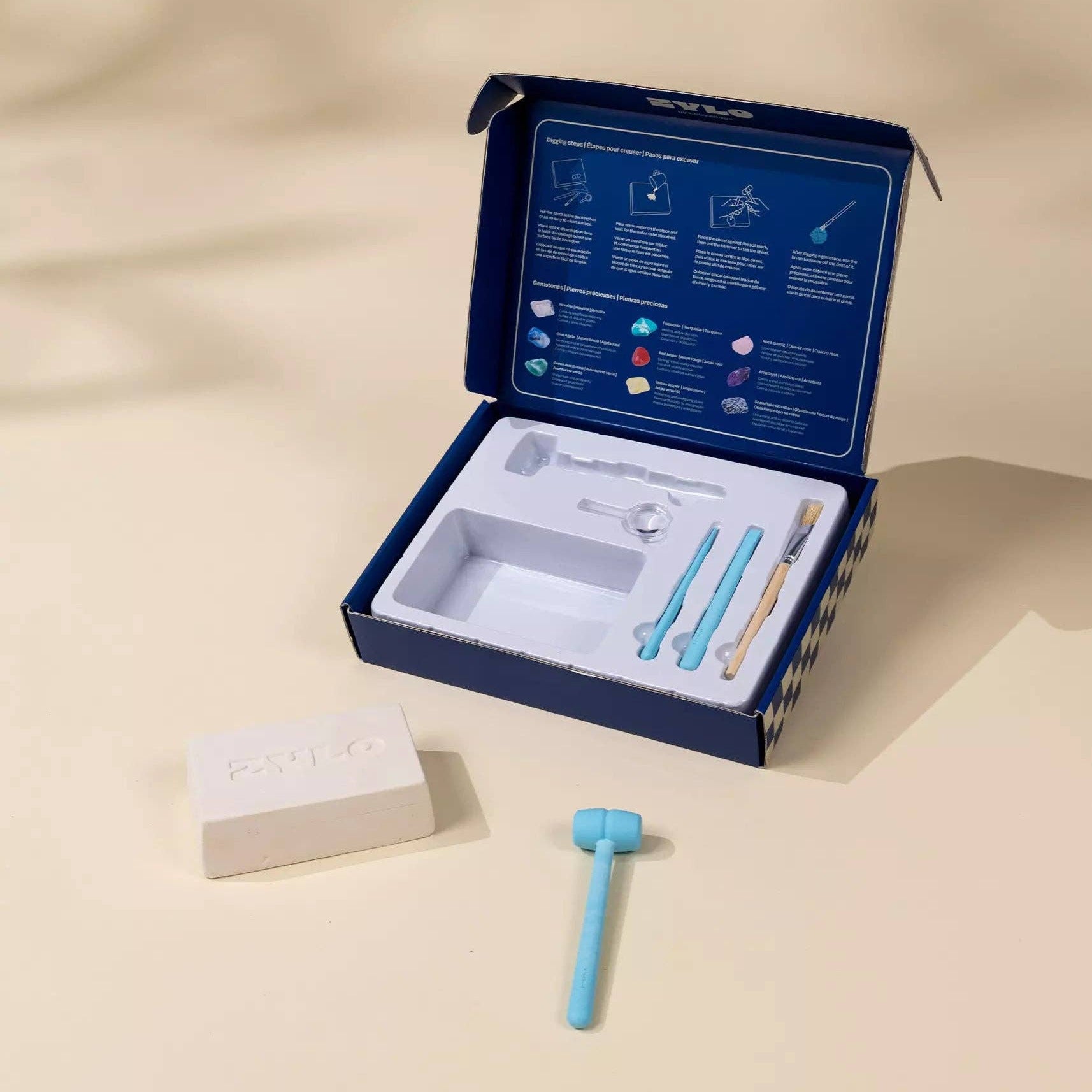 Cosmetic or skincare product set with tools and packaging on a beige background