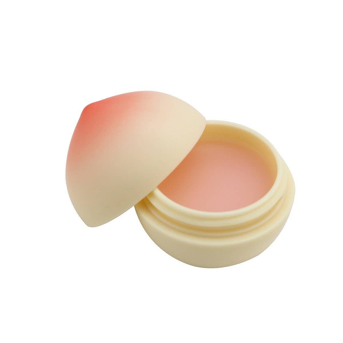 Lip balm with a peach-shaped container on a white background