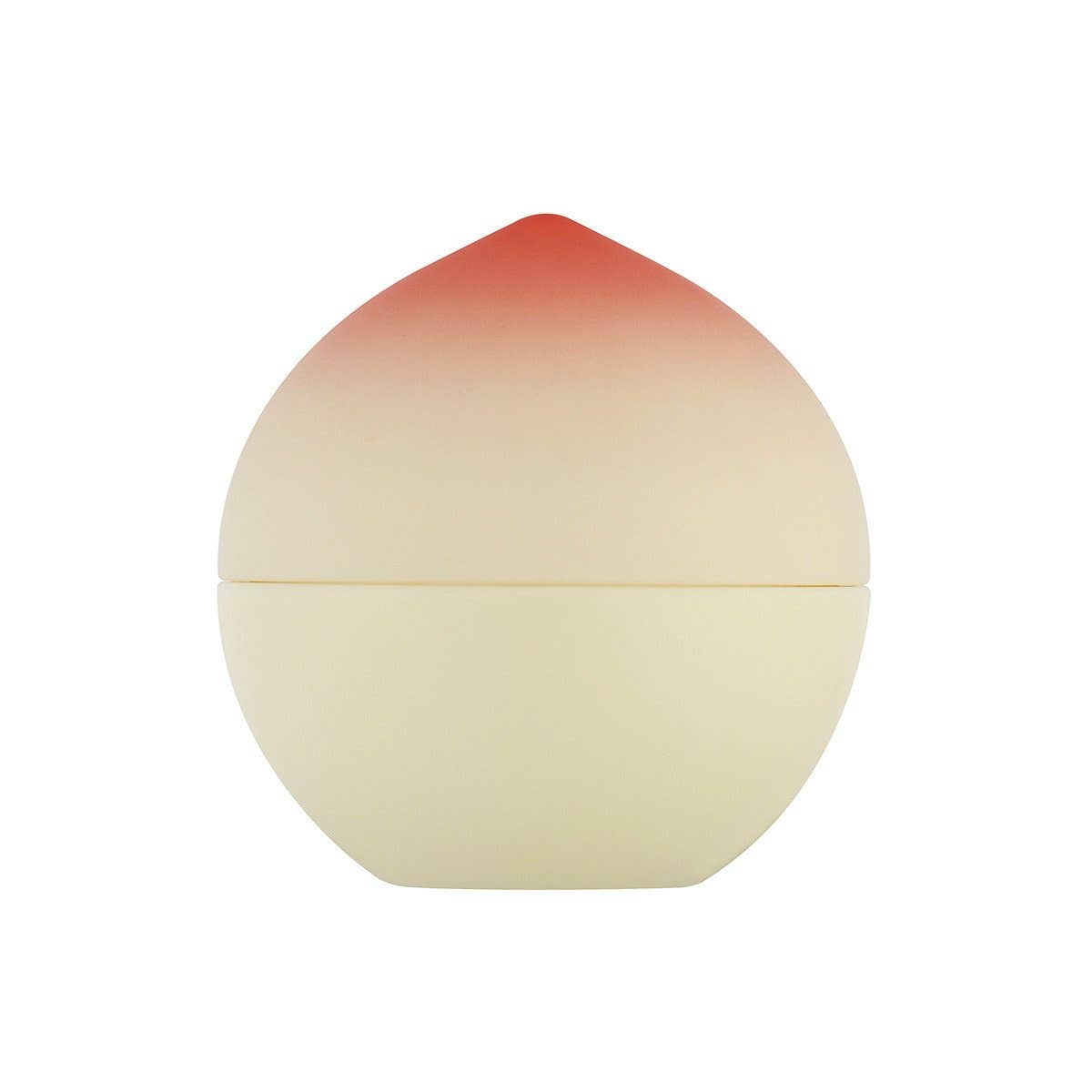 Round cosmetic product with gradient color from red to beige on a white background