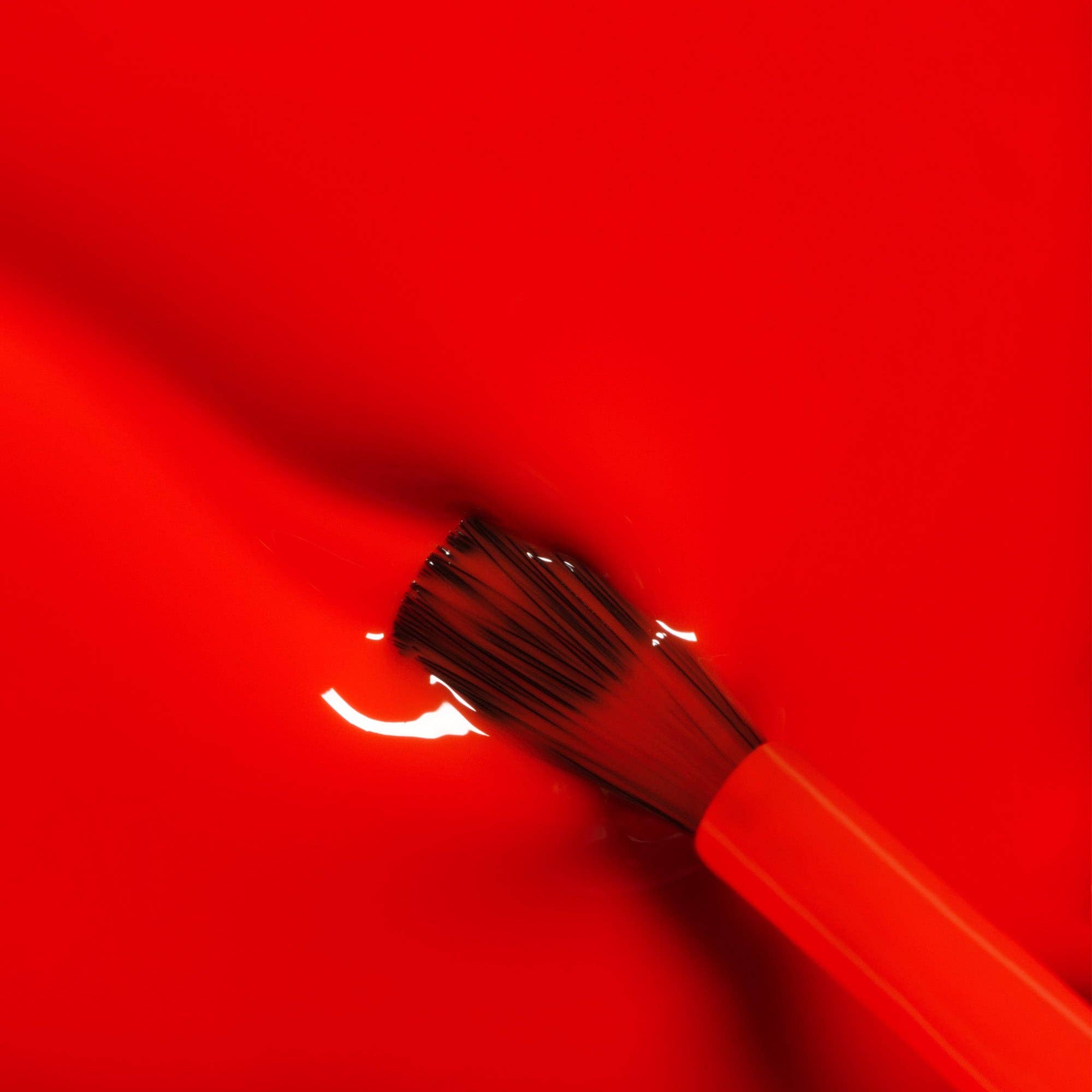 Red brush on a red background