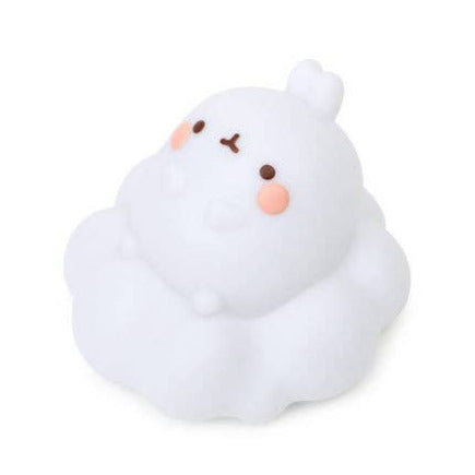 White plush toy with a simple face on a white background