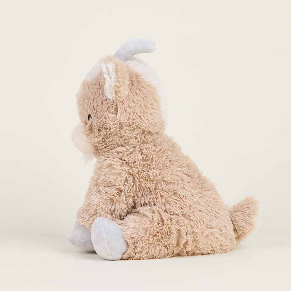 Plush toy elephant on a light gray background