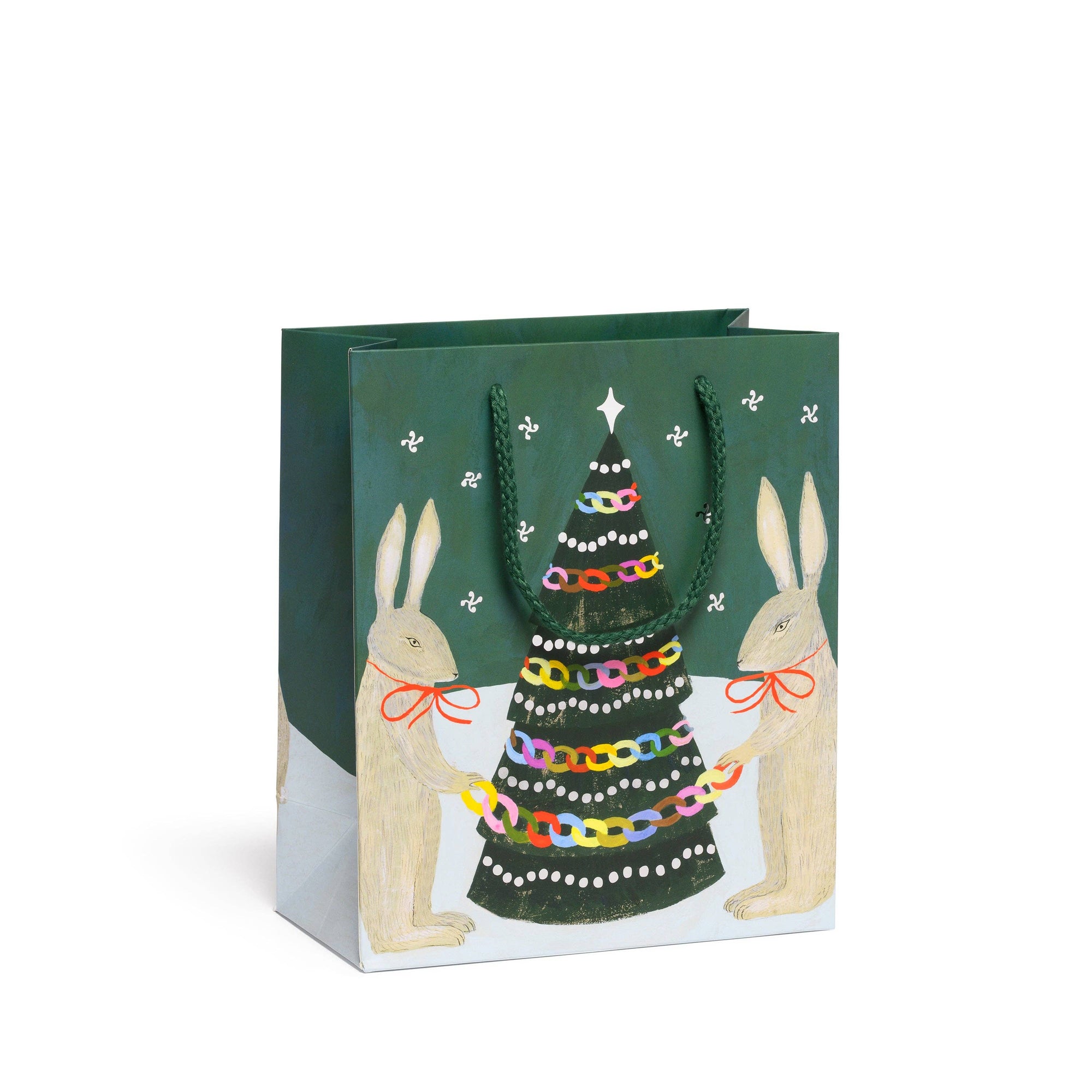 Gift bag with Christmas tree and rabbits design on a white background