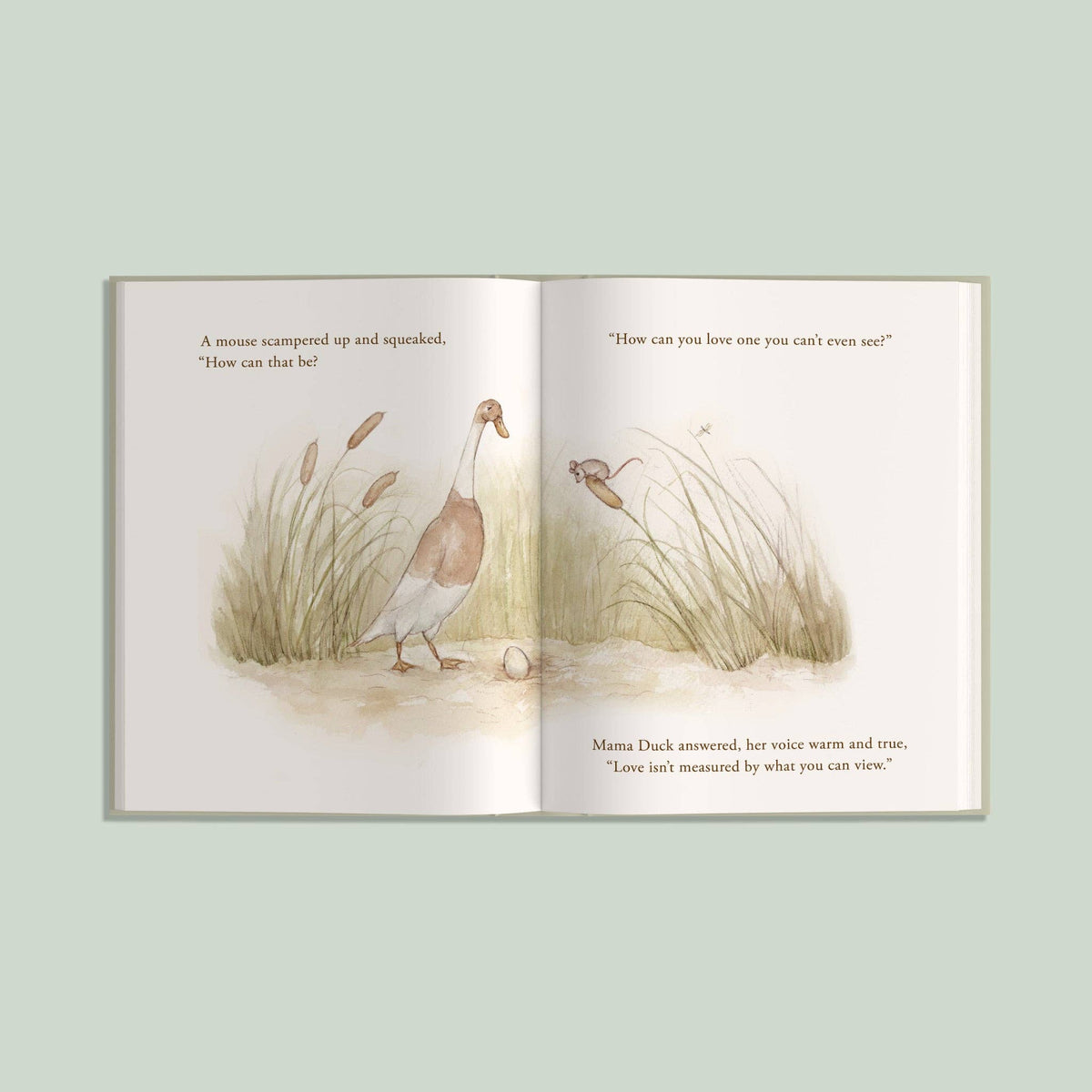 Open book with illustrations of a duck and a mouse on a light green background