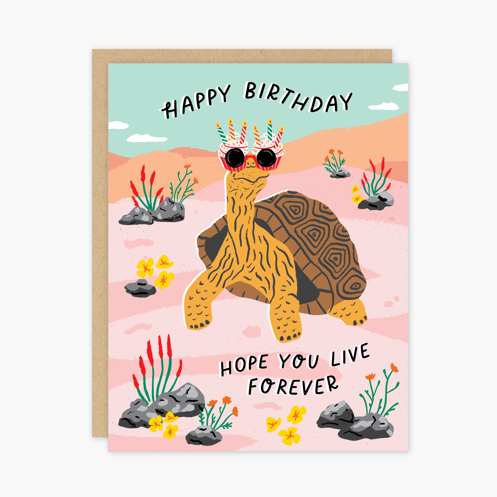Birthday card with a tortoise wearing sunglasses and birthday hats, set against a desert landscape.