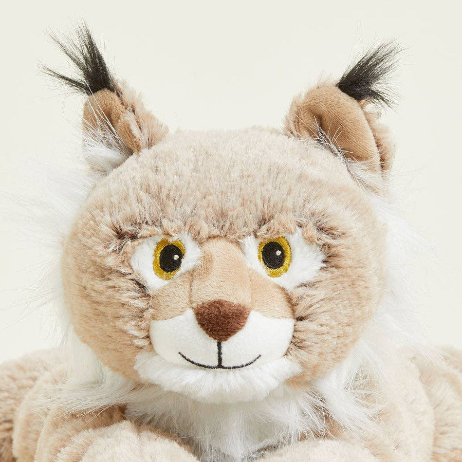 Plush toy resembling a lynx on a light background