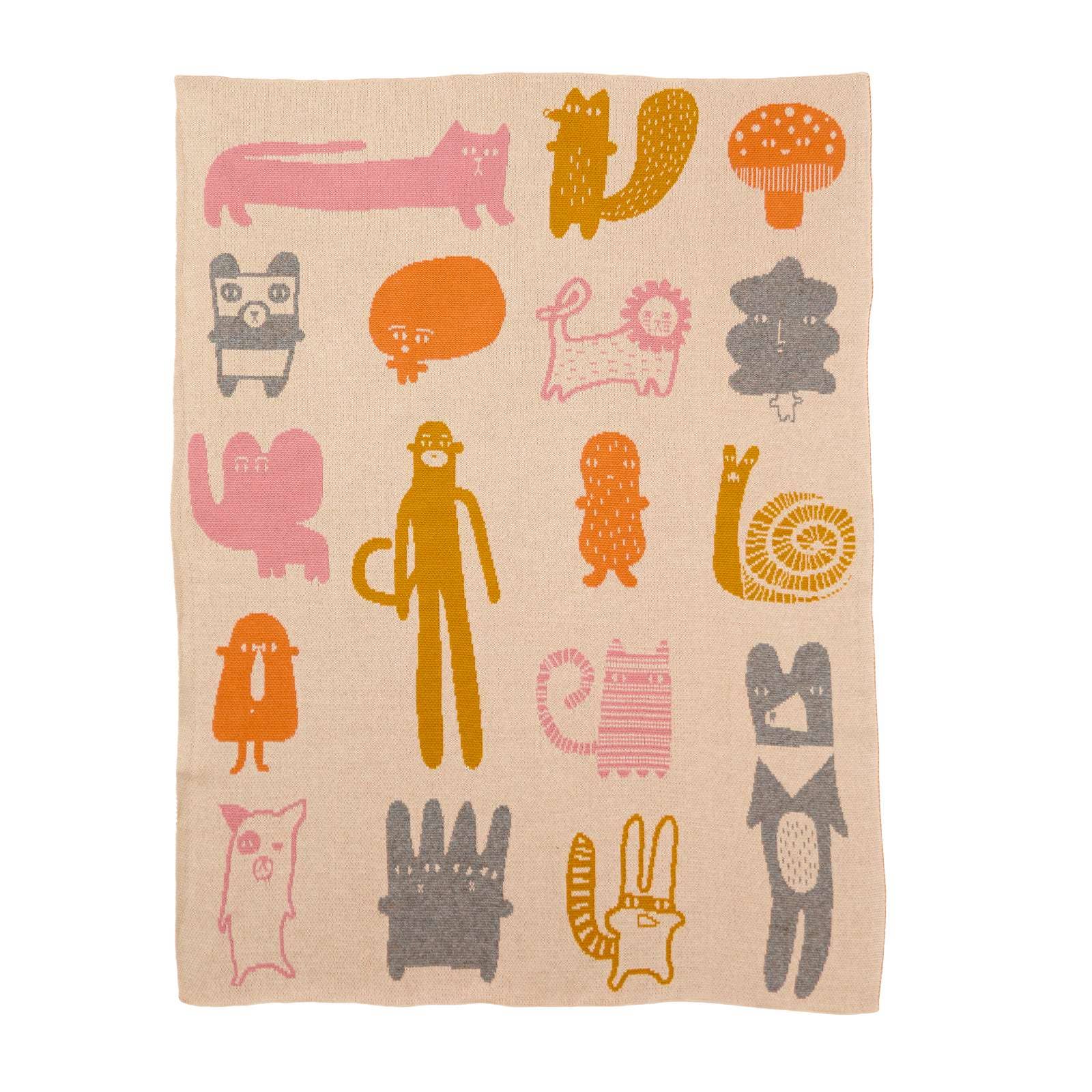 Beige towel with colorful animal illustrations on a white background