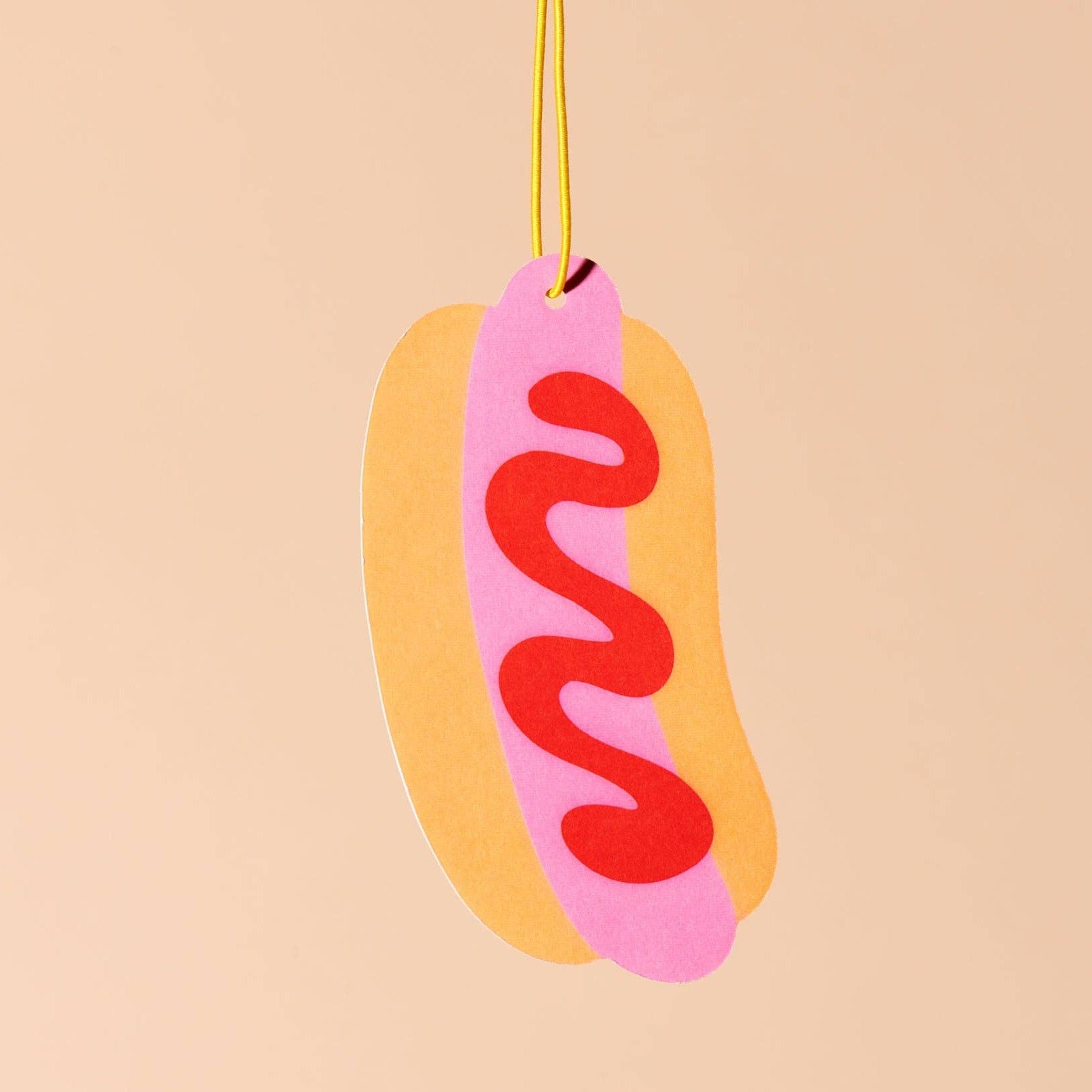 Sunglasses with pink case and red wavy pattern on a beige background