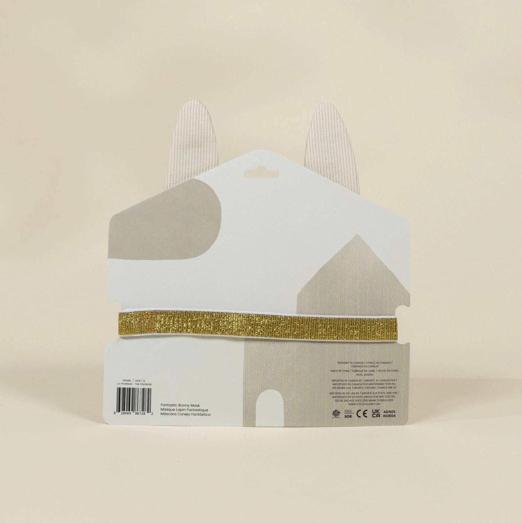 Product packaging with gold band on a beige background