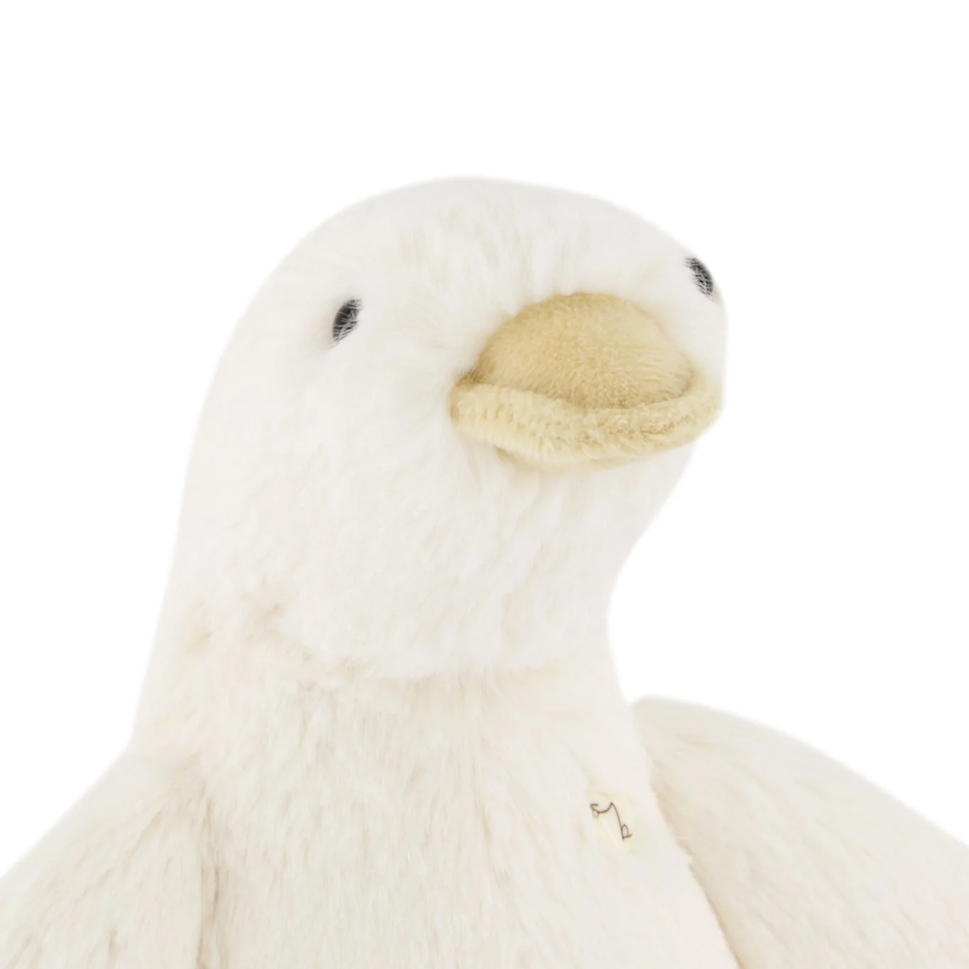 White plush duck toy on a white background