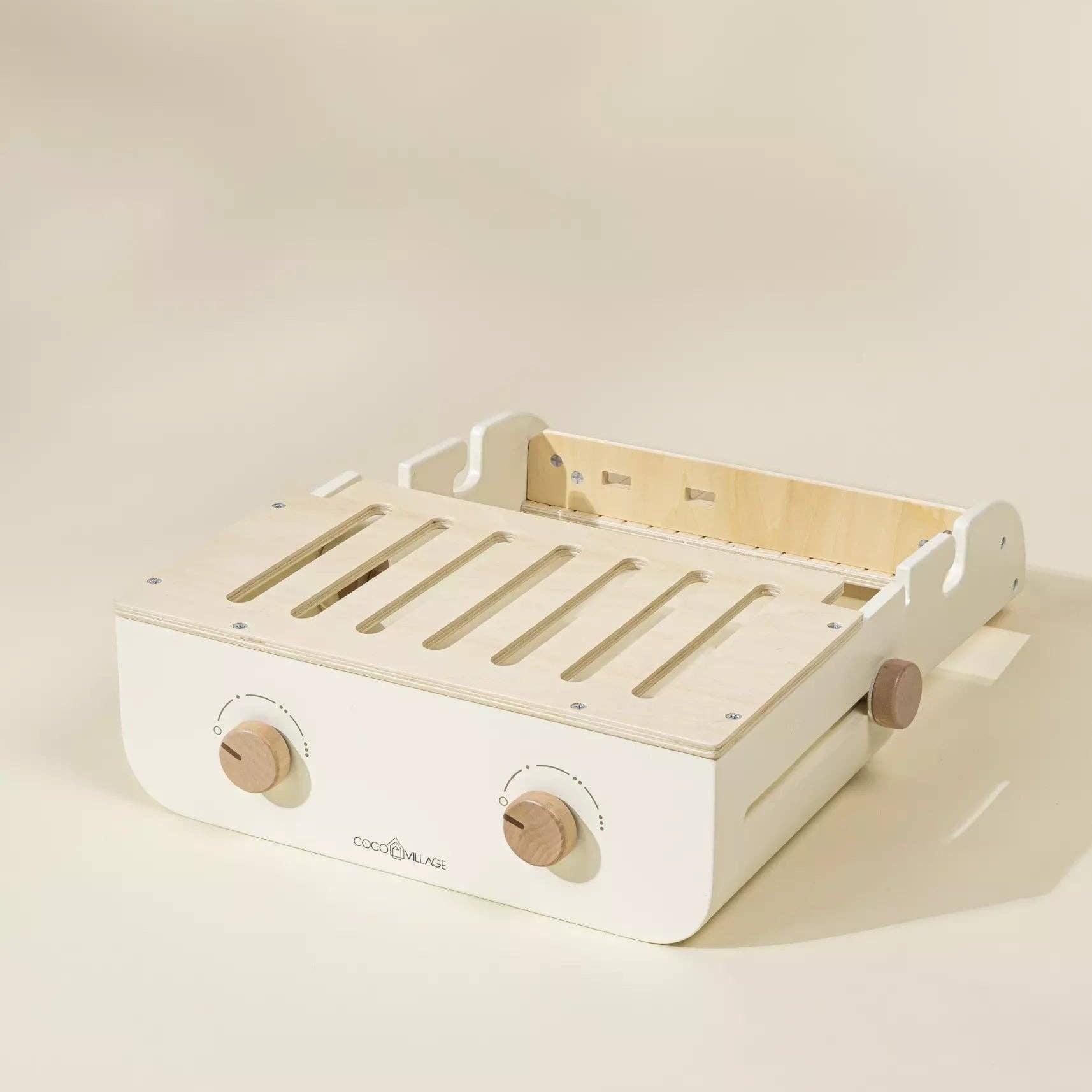 Wooden storage box with slatted interior on a beige background