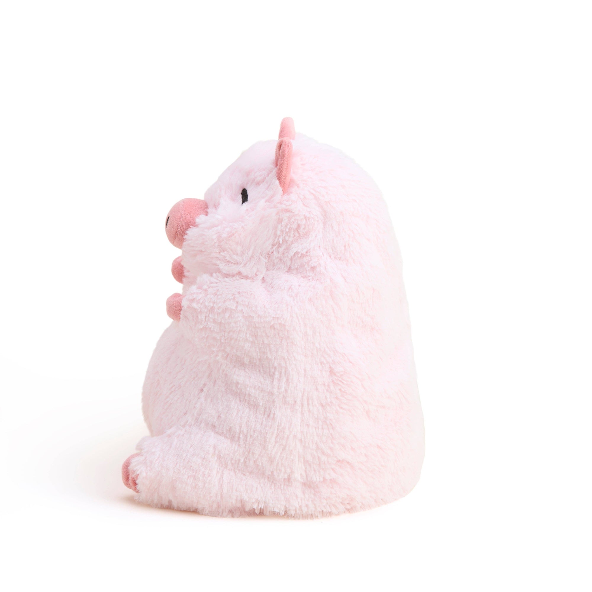 Pink pig plush toy on a white background 