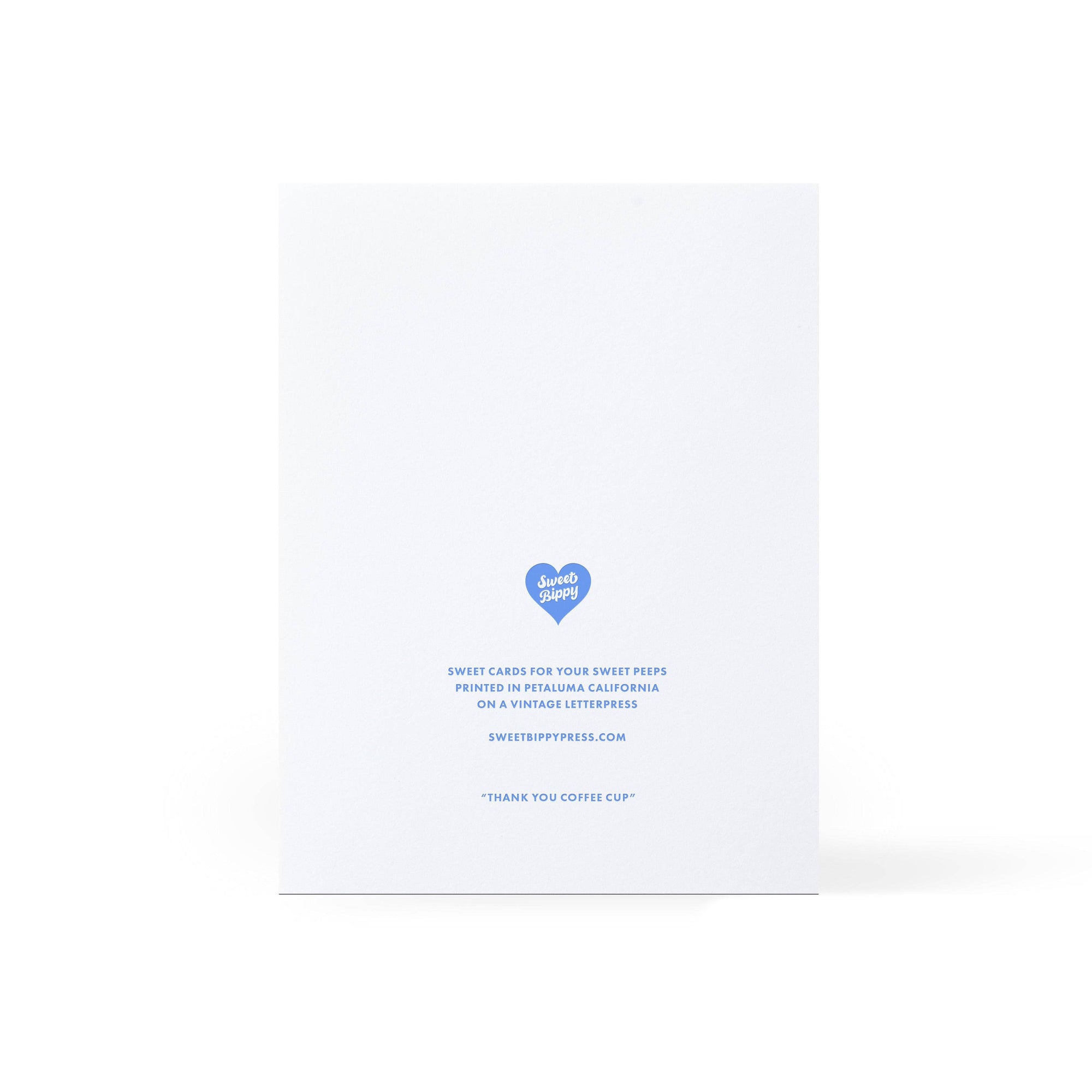 Back of a white card with blue text and a logo on a white background