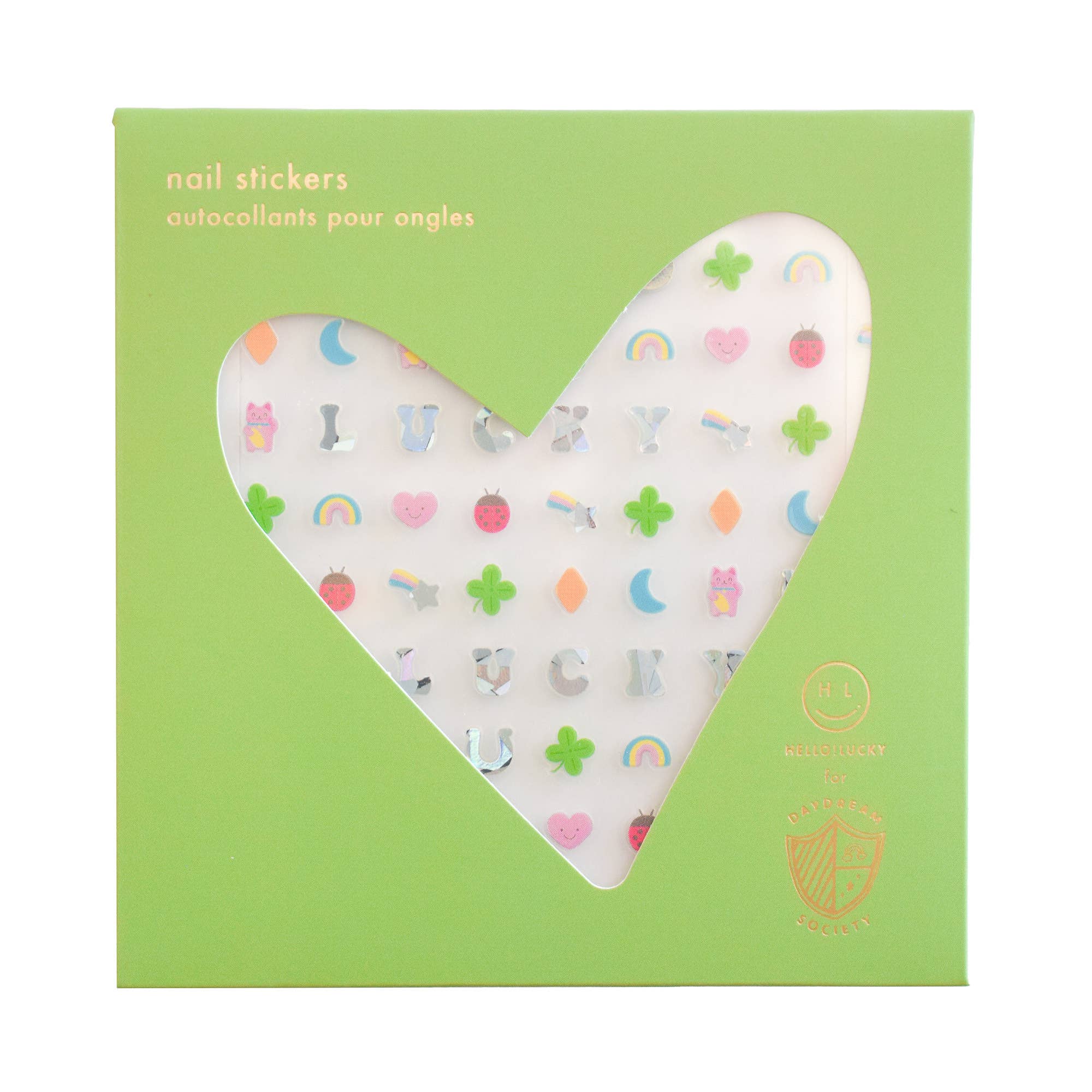 Heart-shaped nail stickers in a green box with a visible brand logo.