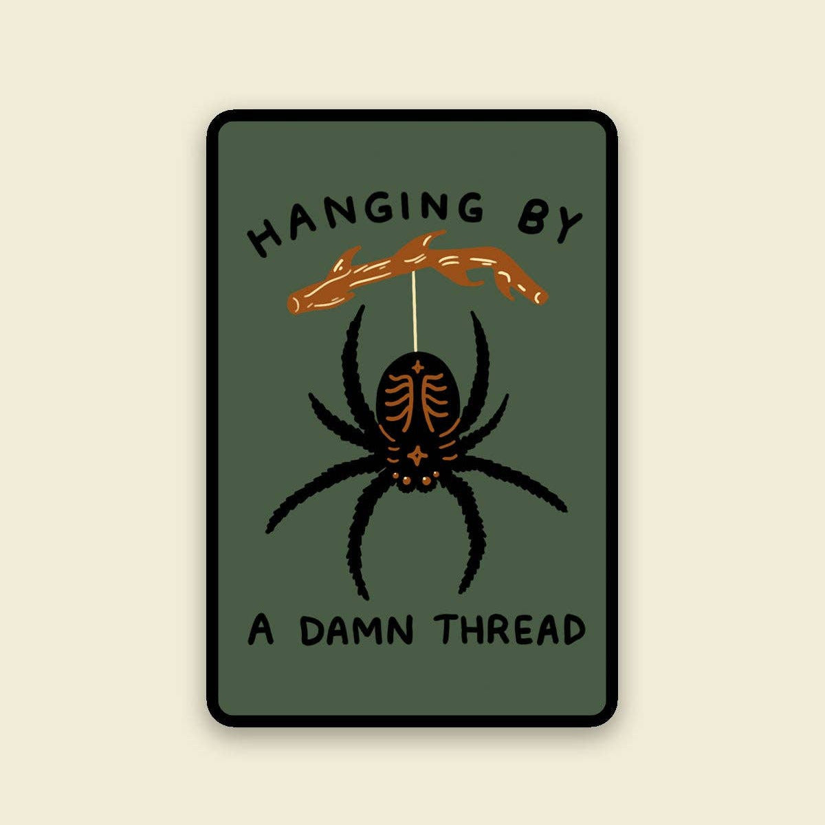 Spider illustration with text 'Hanging by a damn thread' on a green background