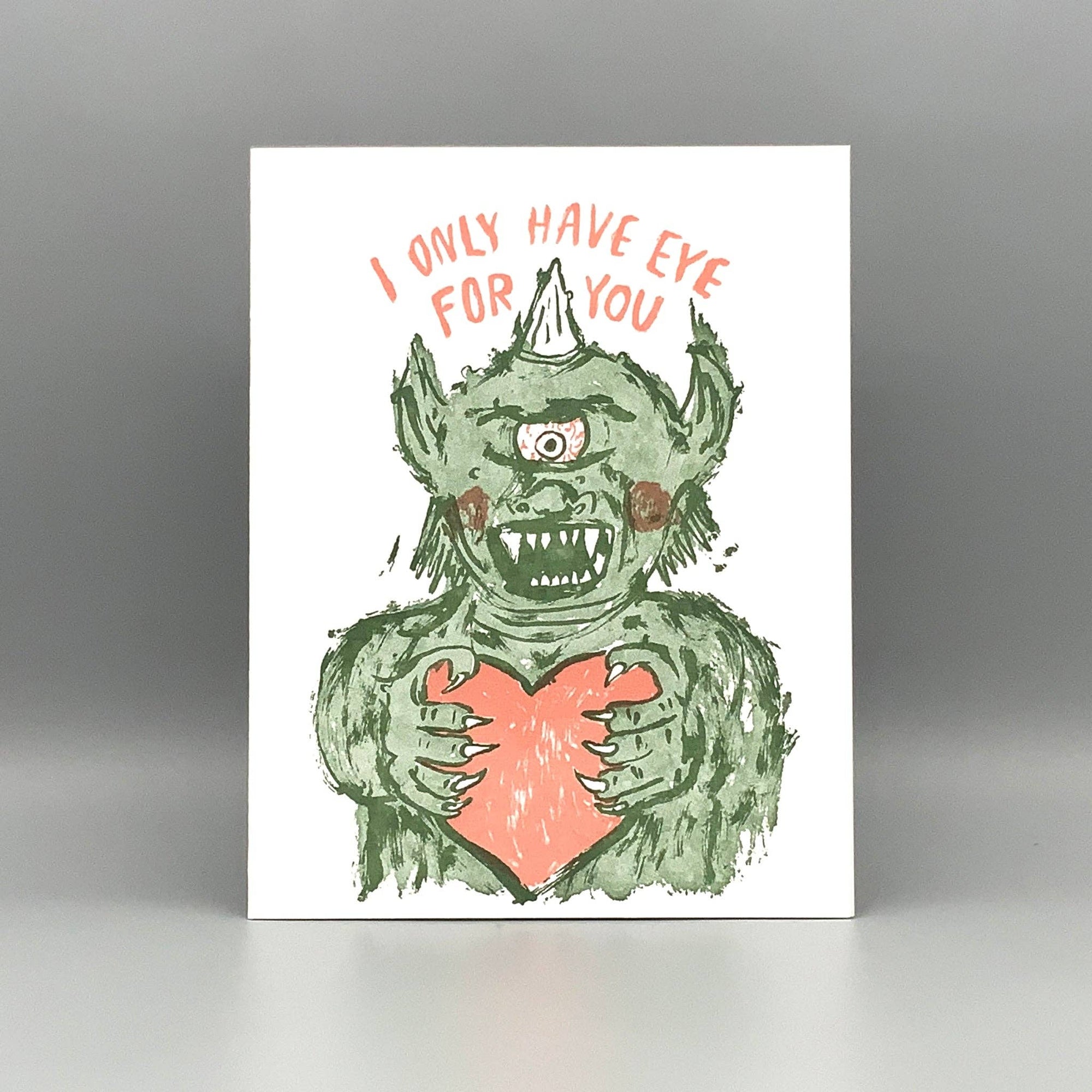 Illustration of a green monster with a heart and text 'I only have eye for you' on a white background.