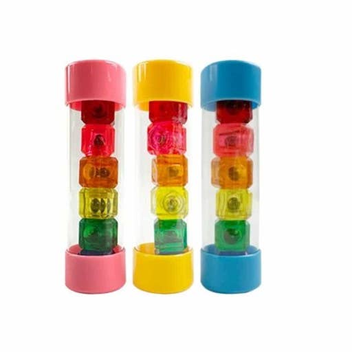 Three colorful cylindrical containers with transparent tops and multicolored jackstones inside on a white background.