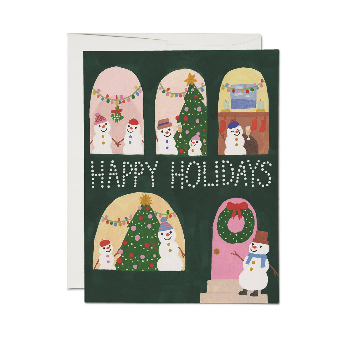 A Christmas greeting card with a dark green background and six illustrated holiday scenes featuring snowmen, Christmas trees, wreaths, and garlands. The card reads “HAPPY HOLIDAYS” in white dotted letters and is shown with a white envelope behind it on a light gray background.