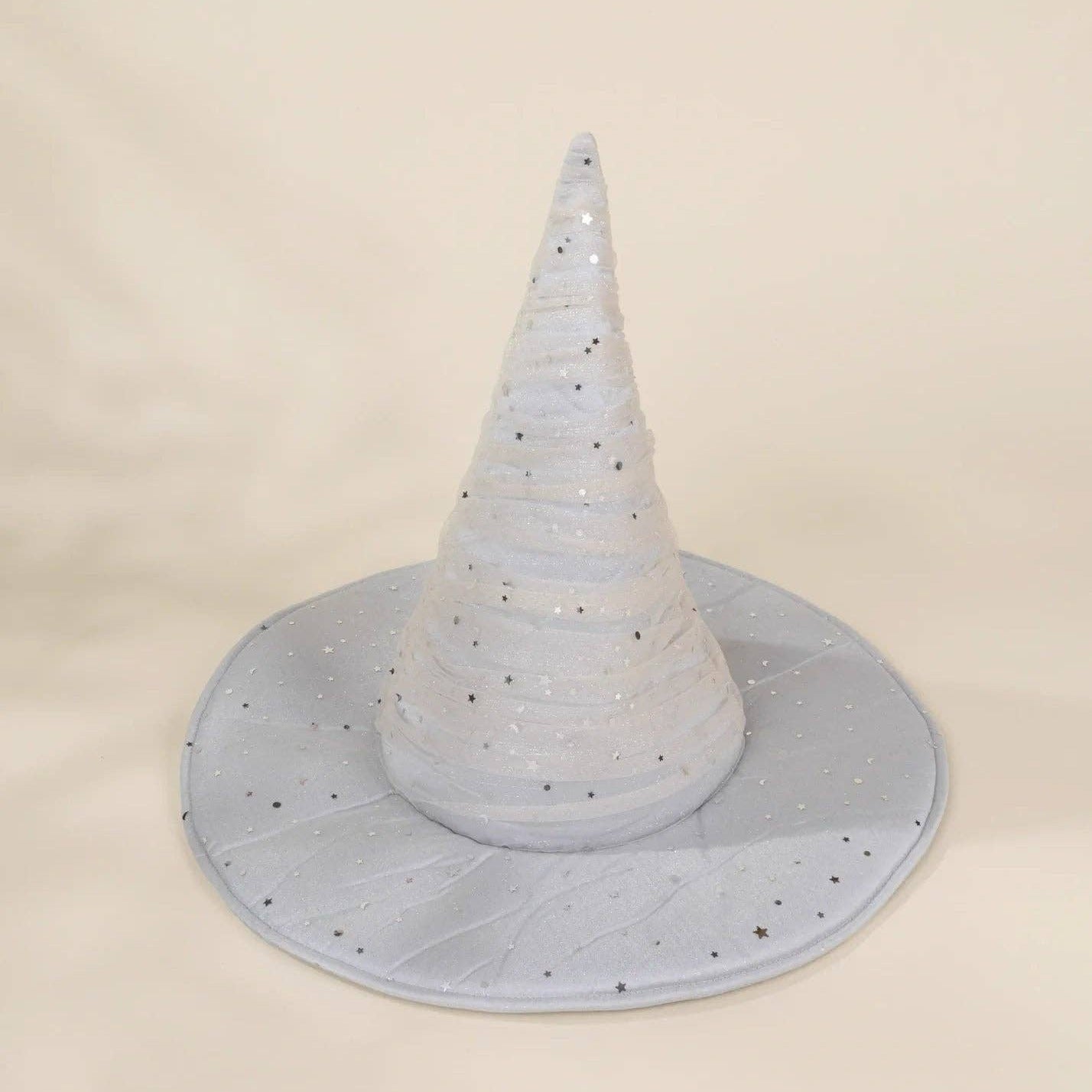 A light blue glittery witch hat cone decoration with a matching wide brim, photographed against a neutral cream background.