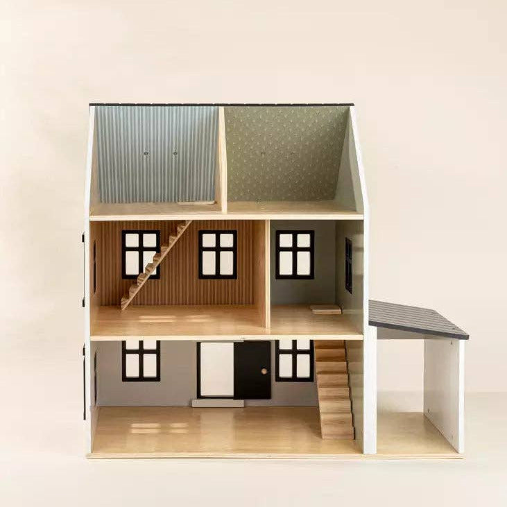 Model of a modern house with different sections on a plain background