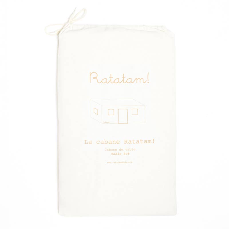 White tote bag with gold text on a white background