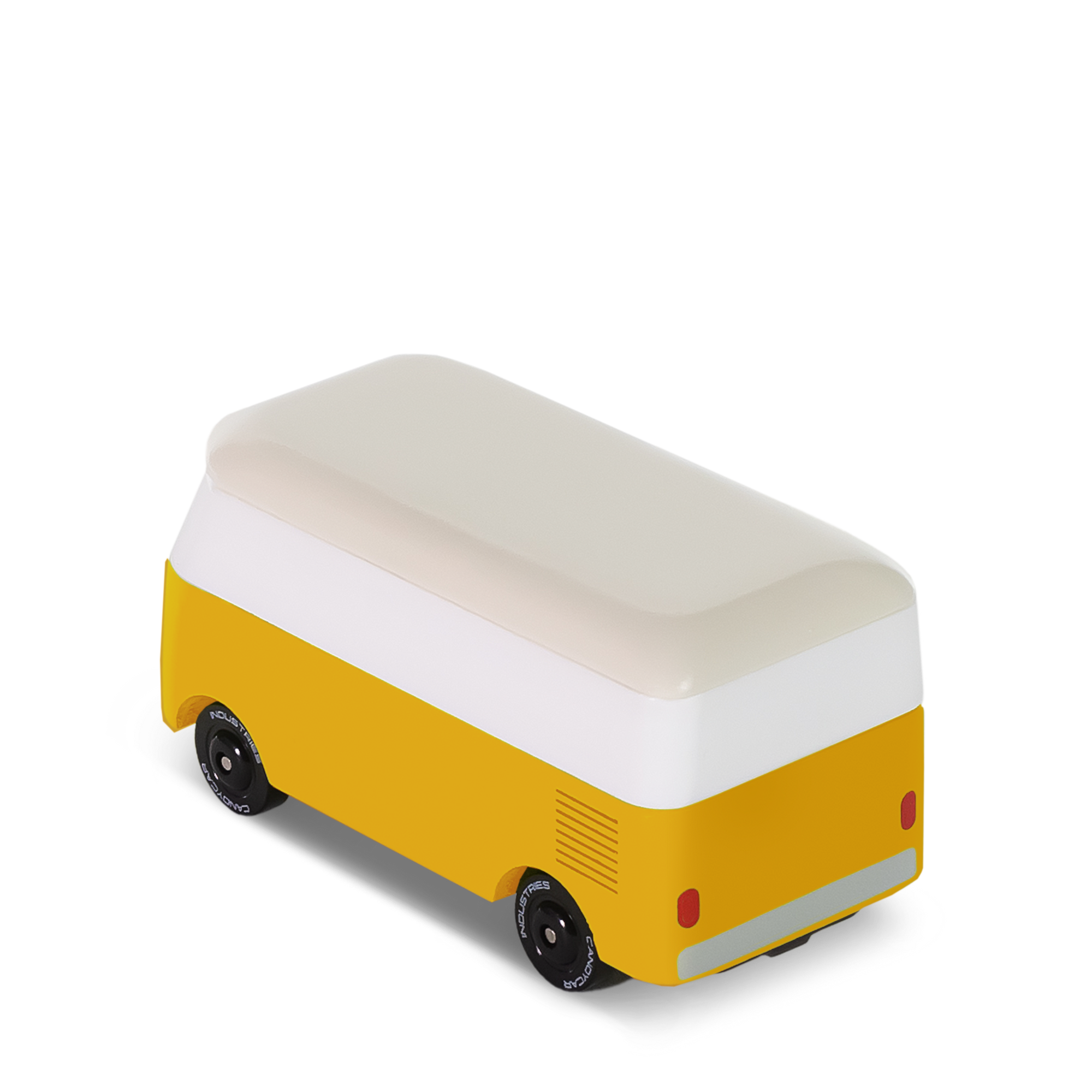 Yellow and white van-shaped ottoman on a white background
