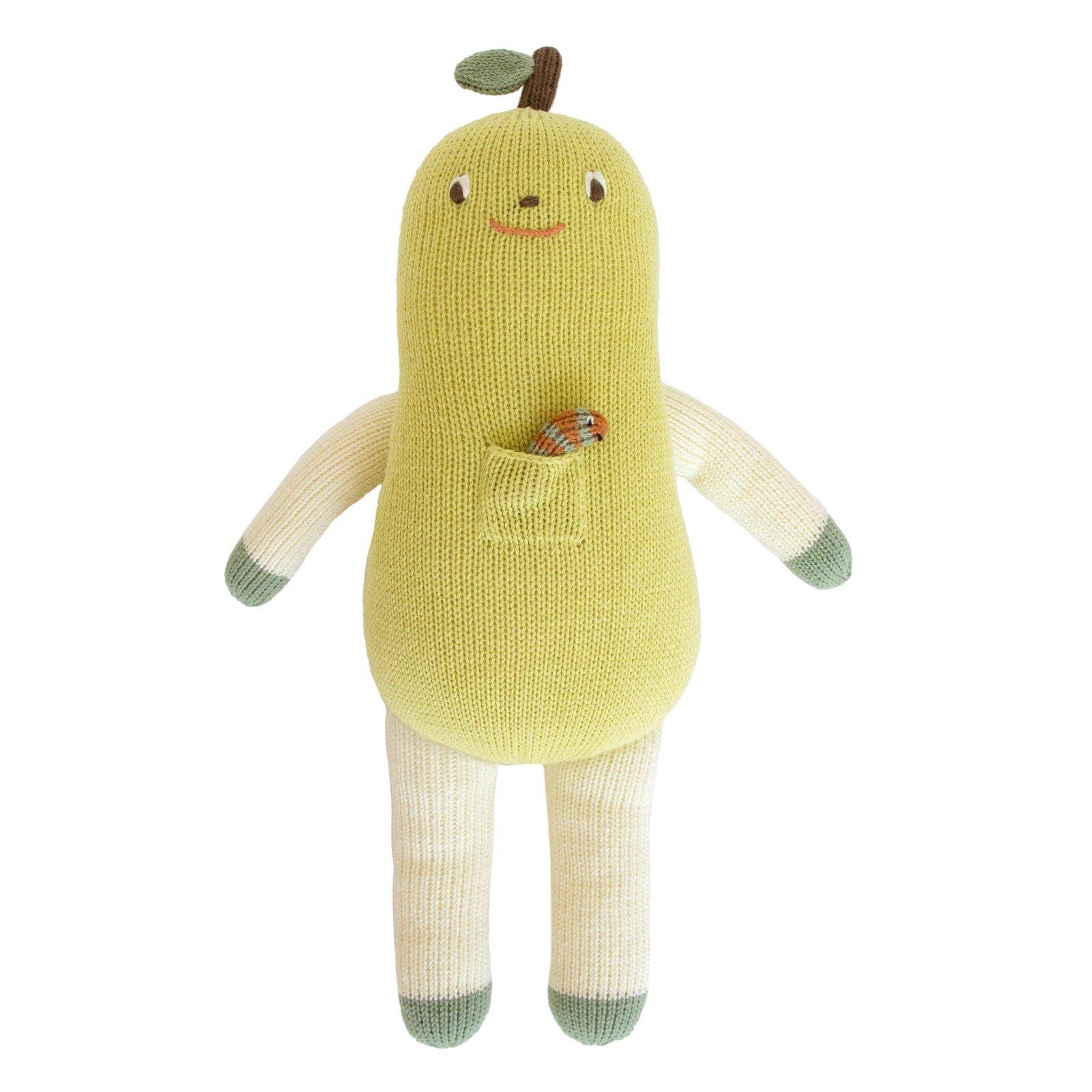 Knitted toy resembling a pear with a smiling face on a white background