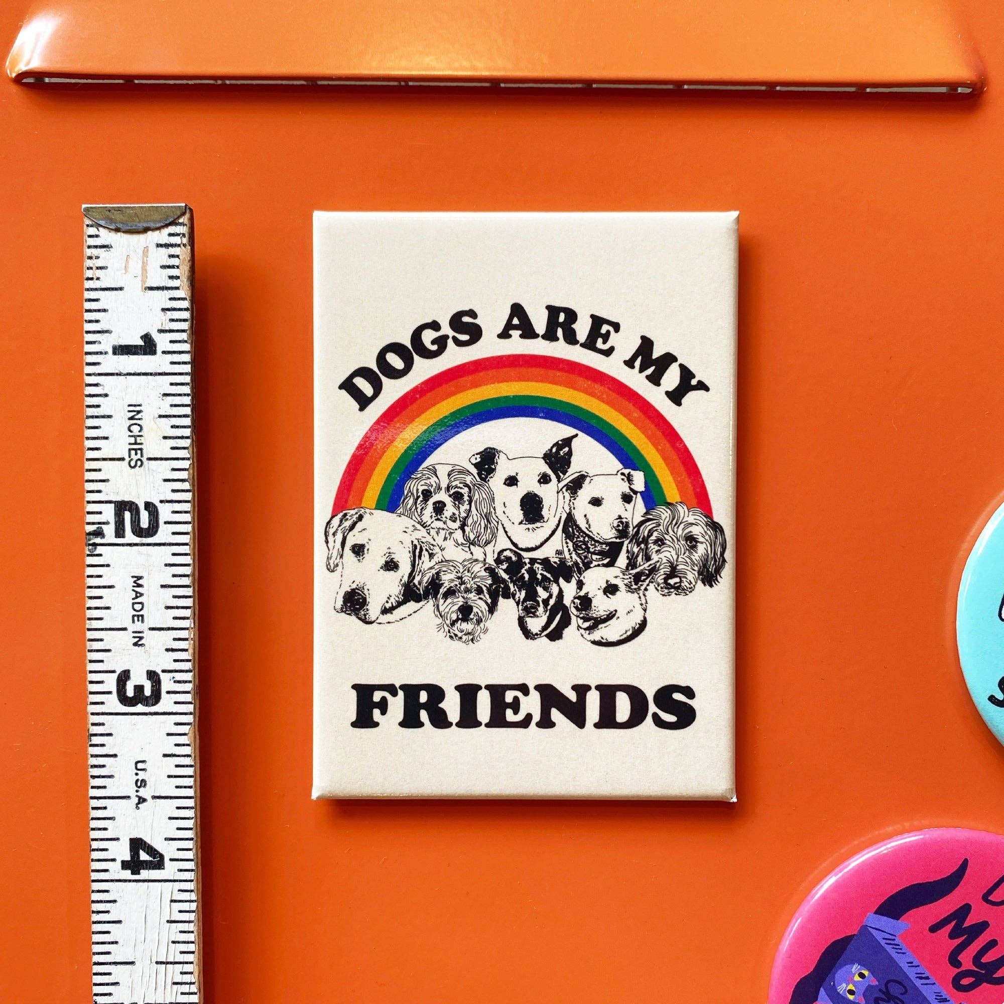 Sticker with 'Dogs are my friends' text and rainbow design on an orange background