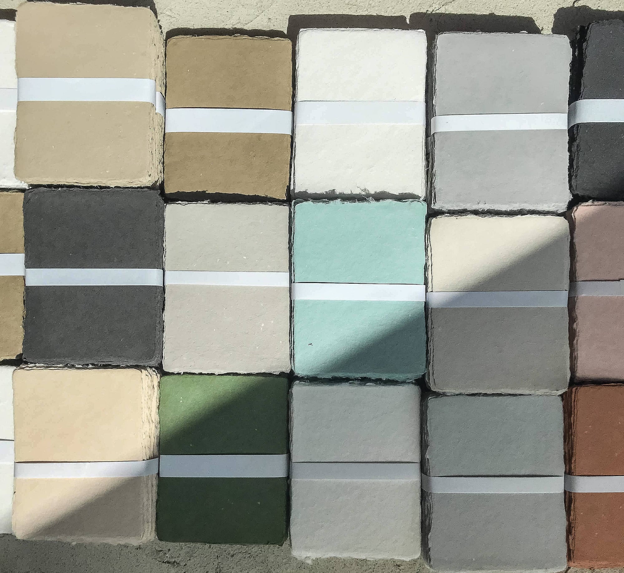 Color swatch of various sheets in different shades.
