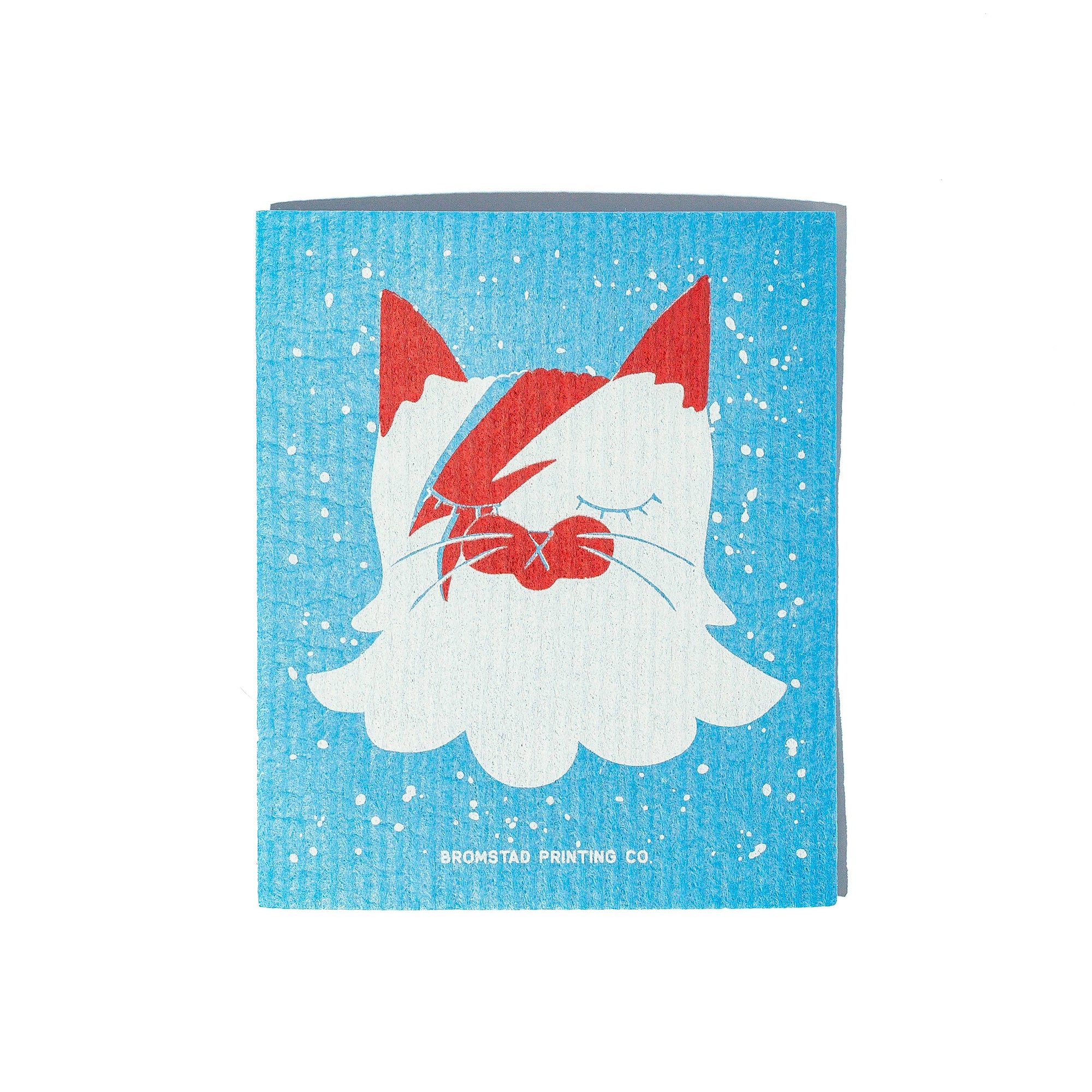 sponge with a cat design on a blue background