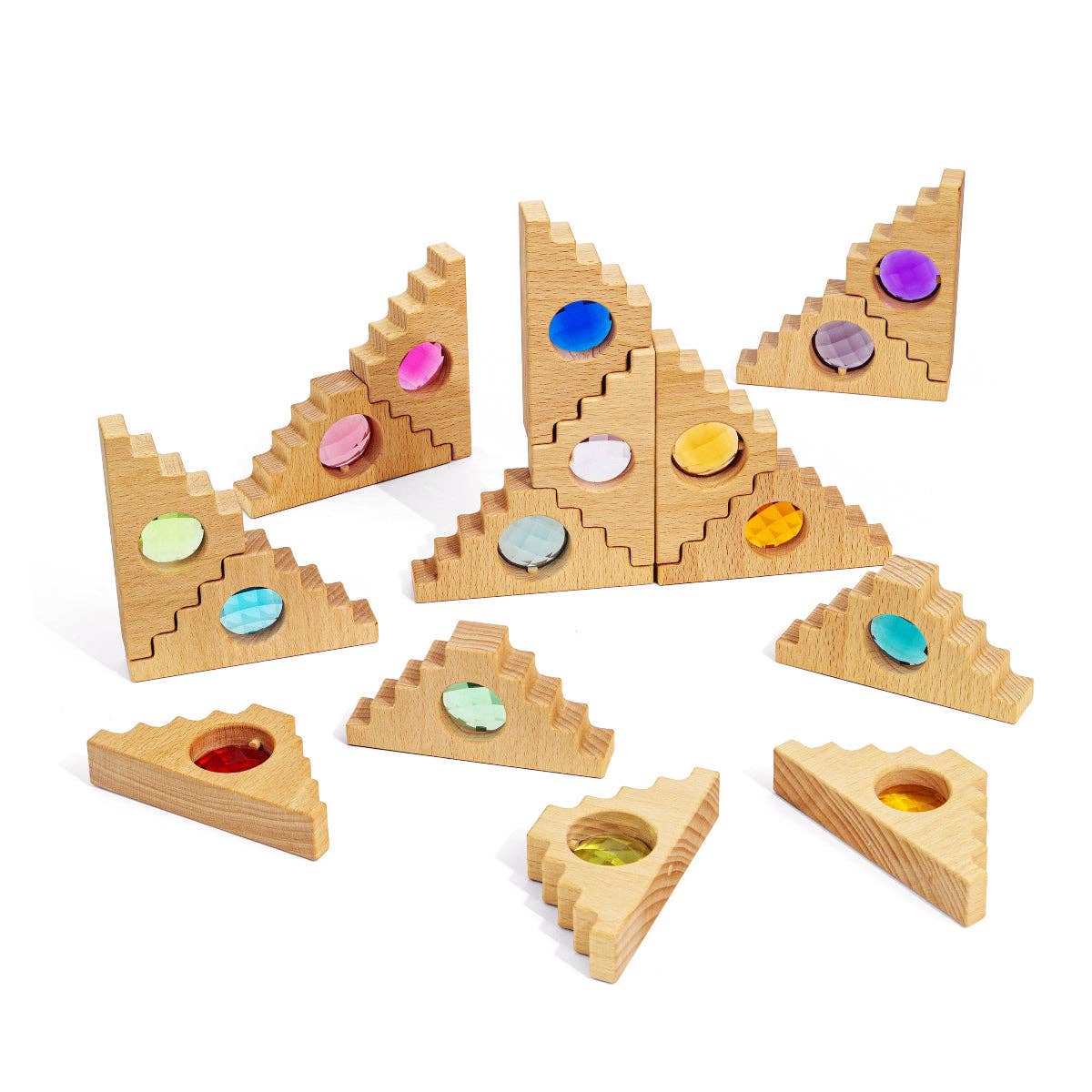 Set of wooden triangle-shaped blocks with colorful circular inserts on a white background