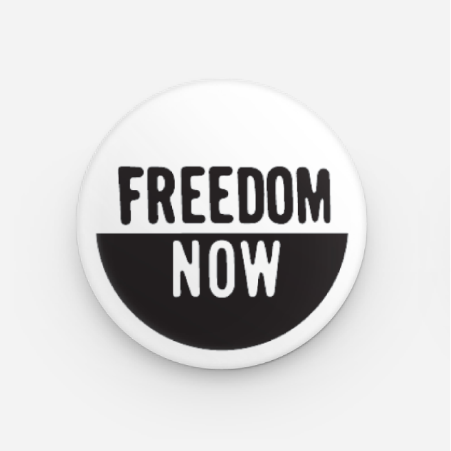 Round button with 'Freedom Now' text on a white background