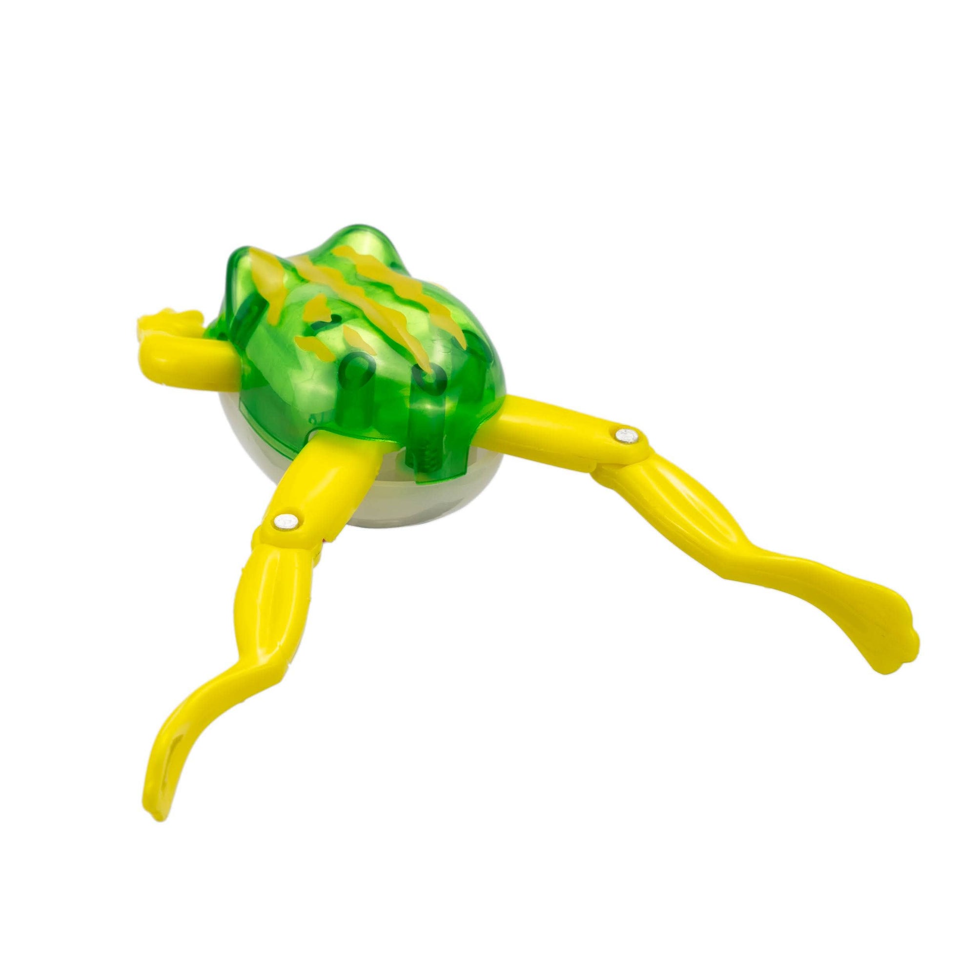 Toy frog with green body and yellow legs on a white background