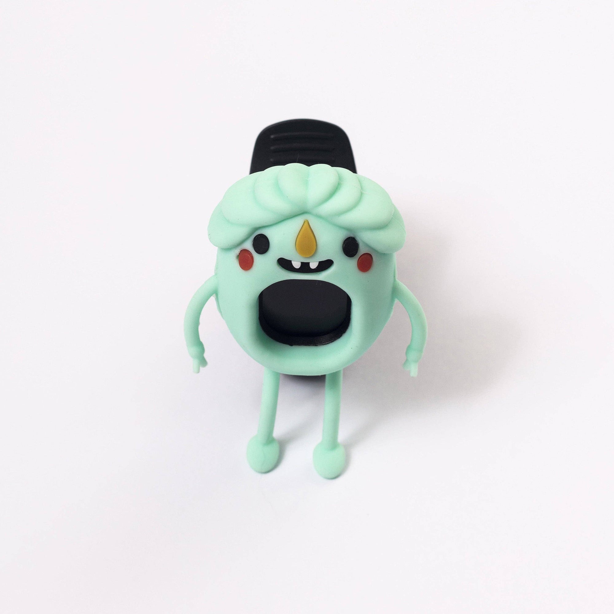 Mint green character with a black hat on a white background
