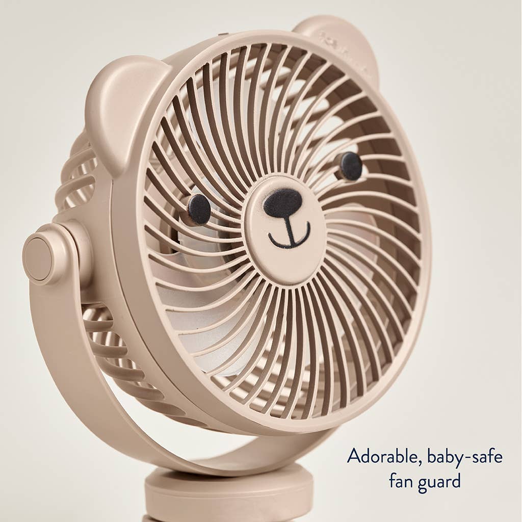 Beige fan with bear face design on a light gray background