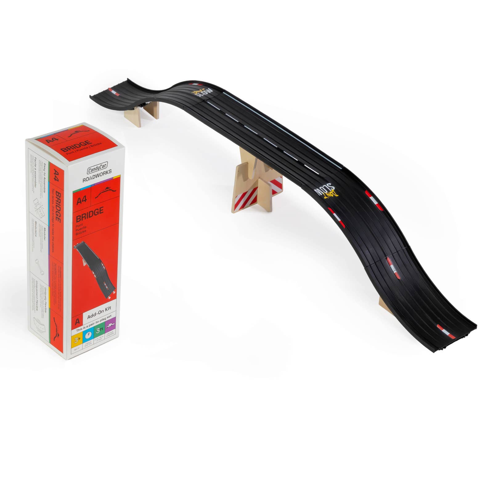Toy race track set with a box on a white background