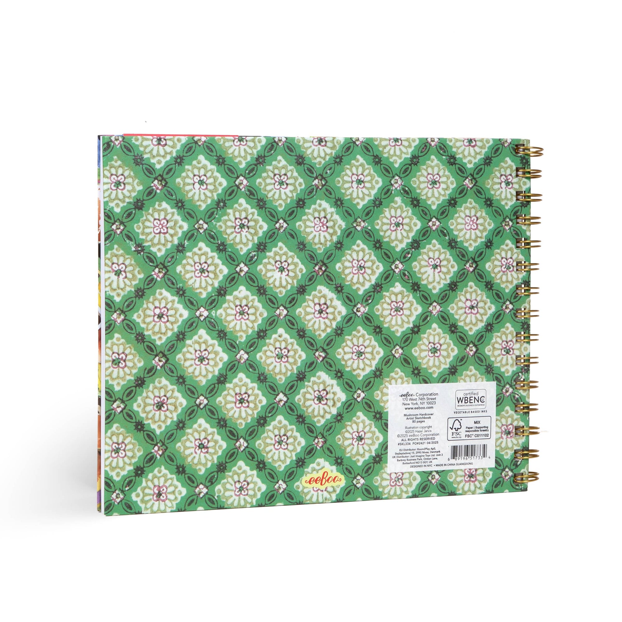 Notebook with green geometric pattern on a white background