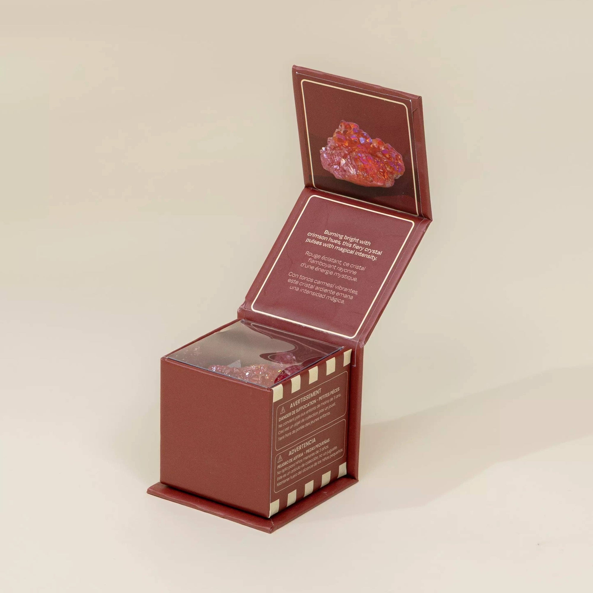 Red jewelry box with a mirror on a beige background