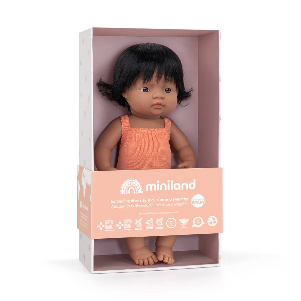 Miniland doll in packaging on a white background
