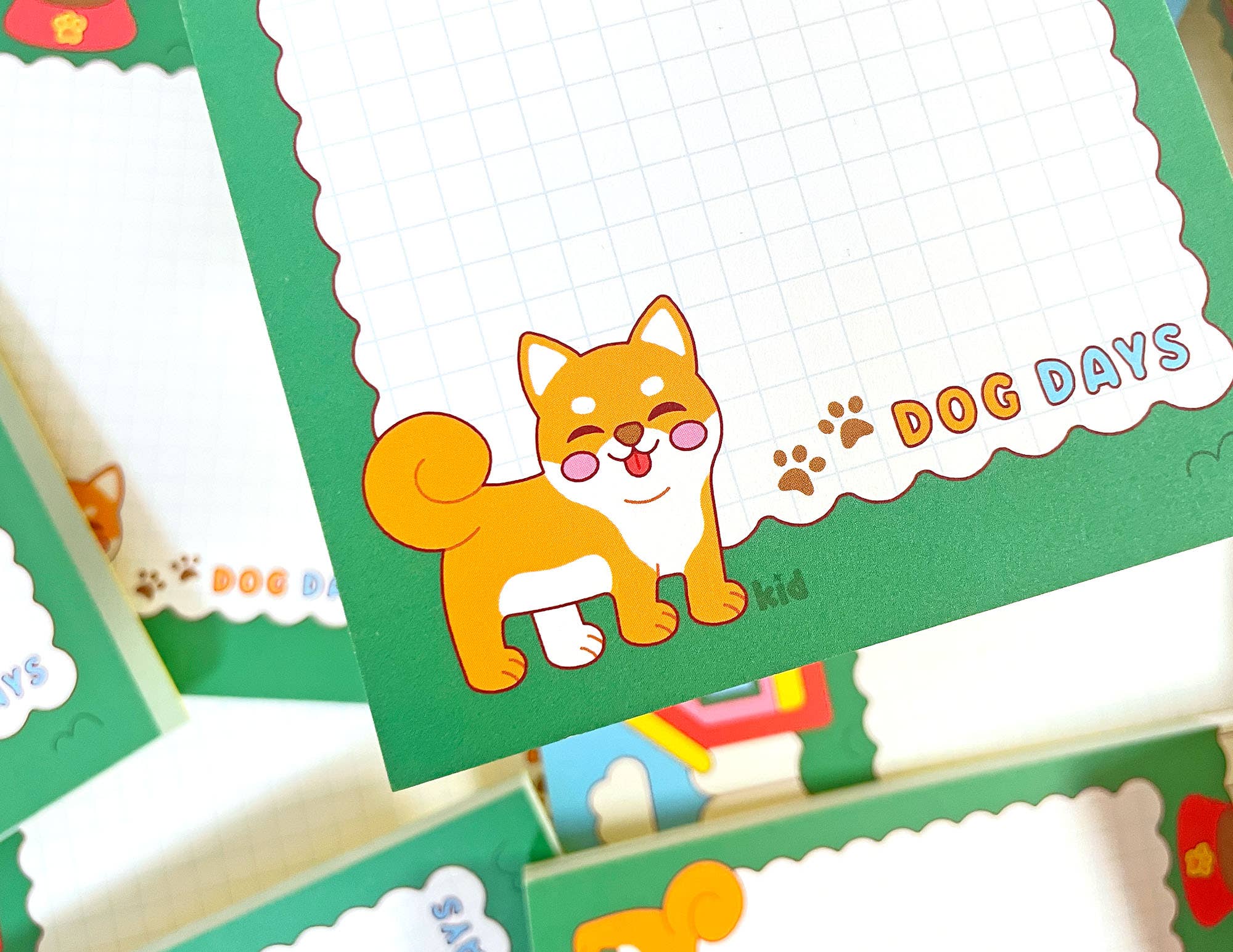 Children's stationery set with a cartoon dog design on a green card.