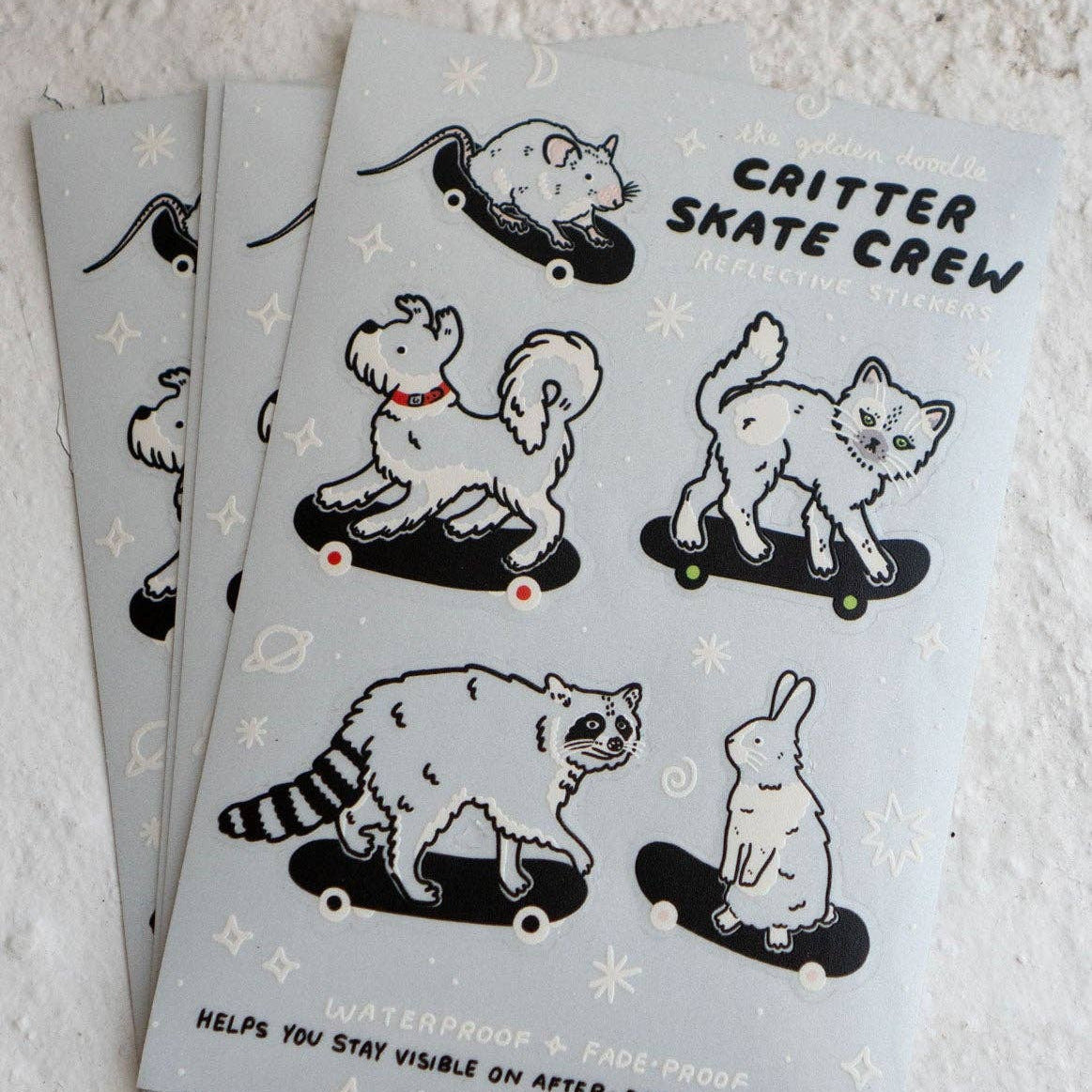 Sticker sheet with animal characters on skateboards and 'Critter Skate Crew' text.