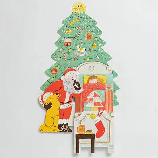 Christmas-themed wall decoration with Santa Claus, dog, and fireplace on a light gray background