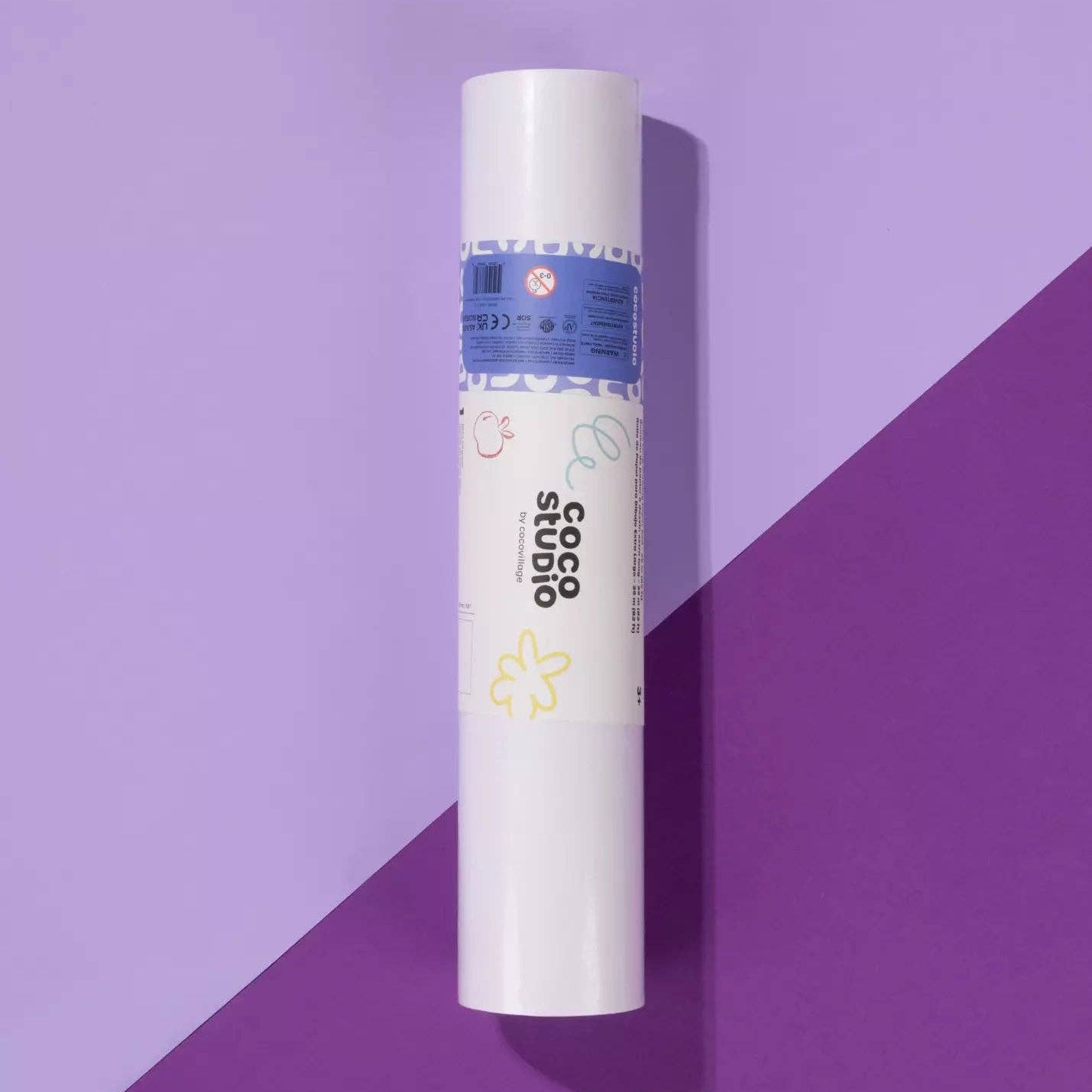 Roll of paper towels on a purple background