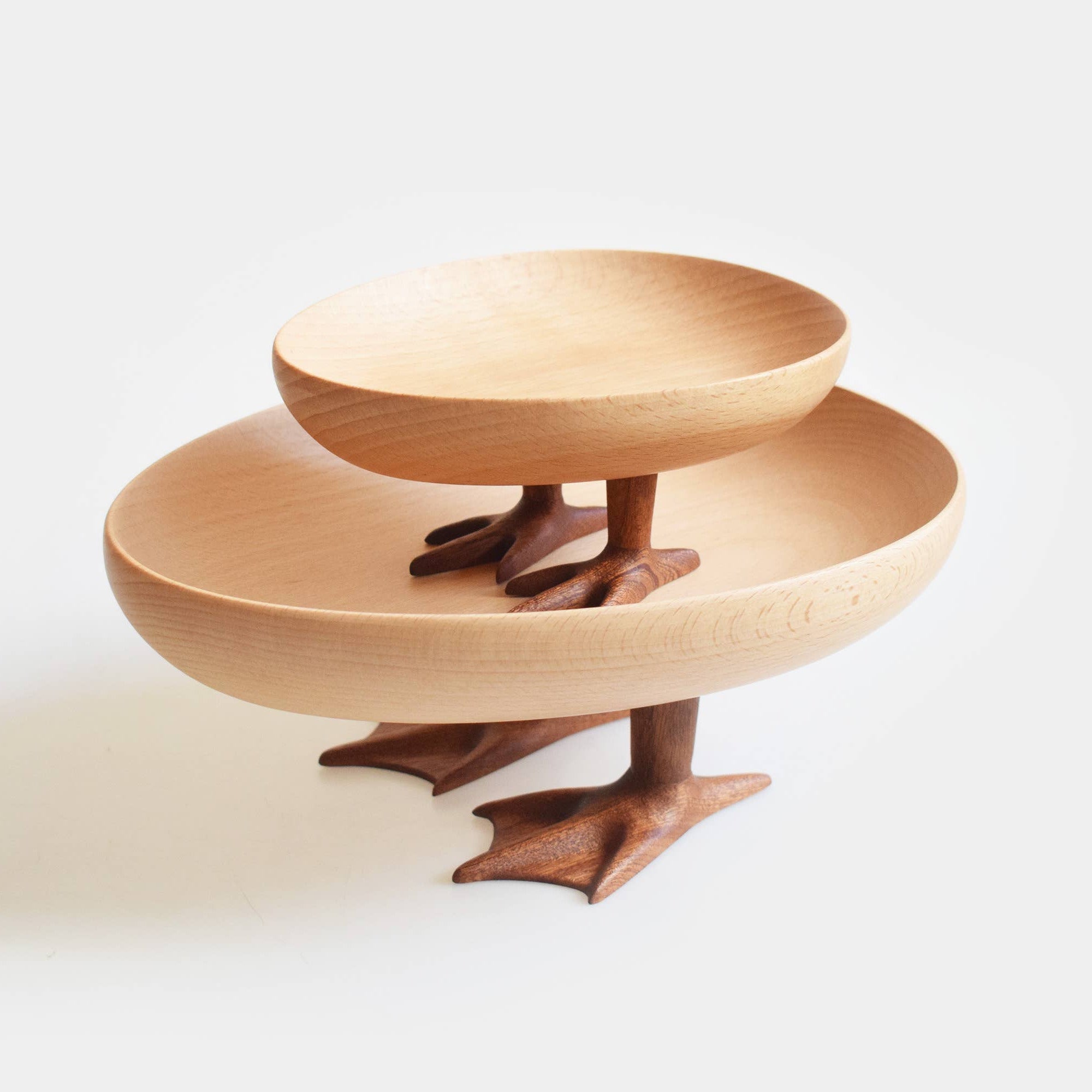 Wooden tiered stand on a white background