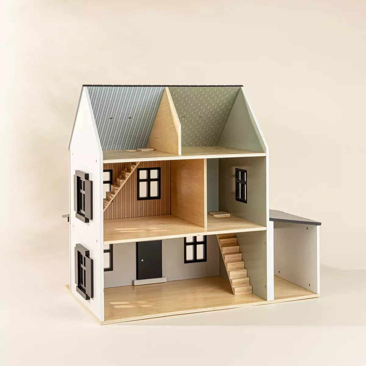 Wooden dollhouse with open front doors on a beige background