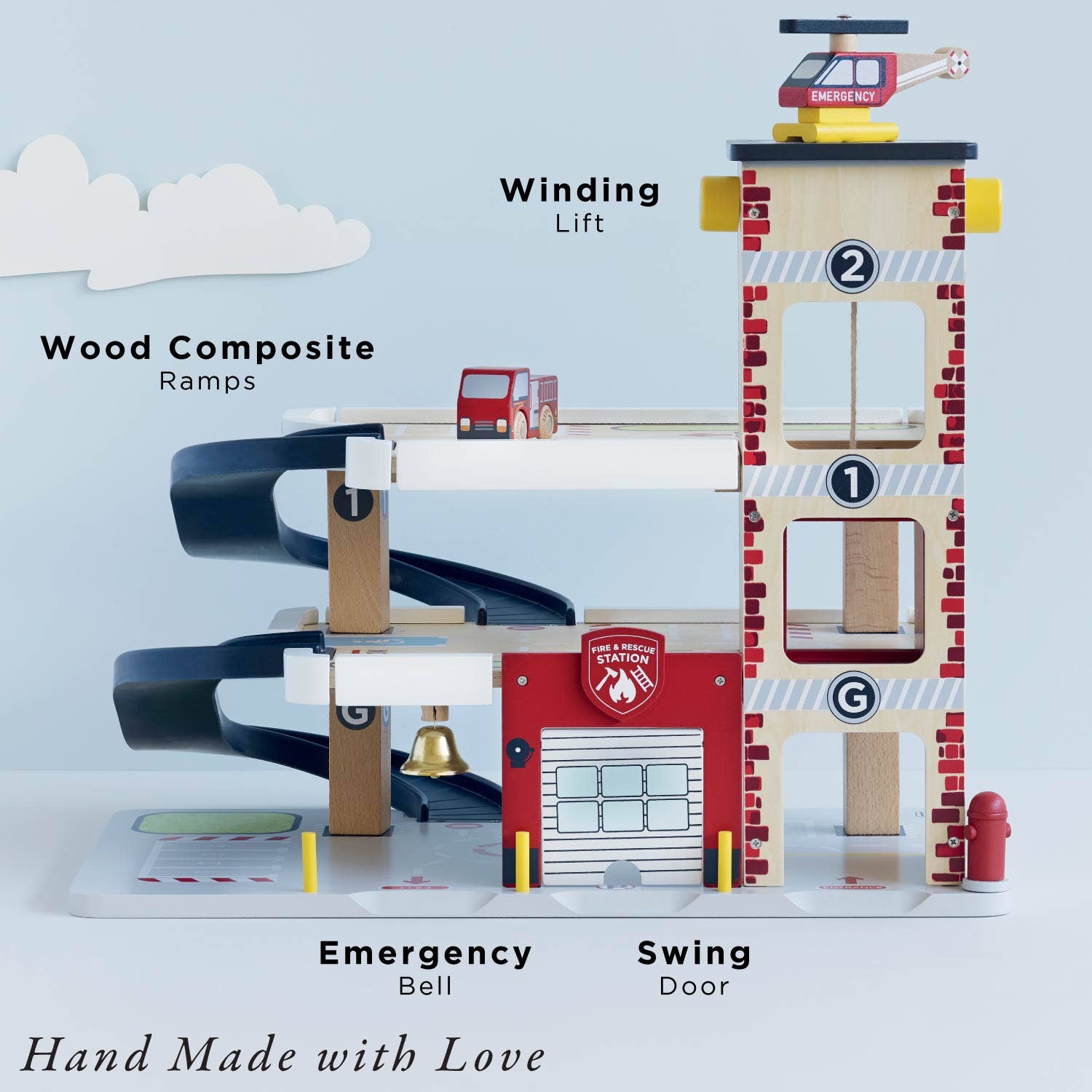 Wooden toy fire station with various features labeled on a light blue background