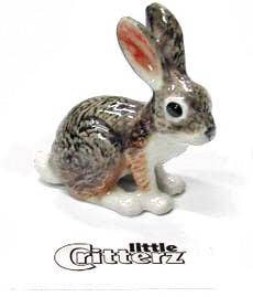 Small rabbit figurine with 'Little Critterz' branding on a white background