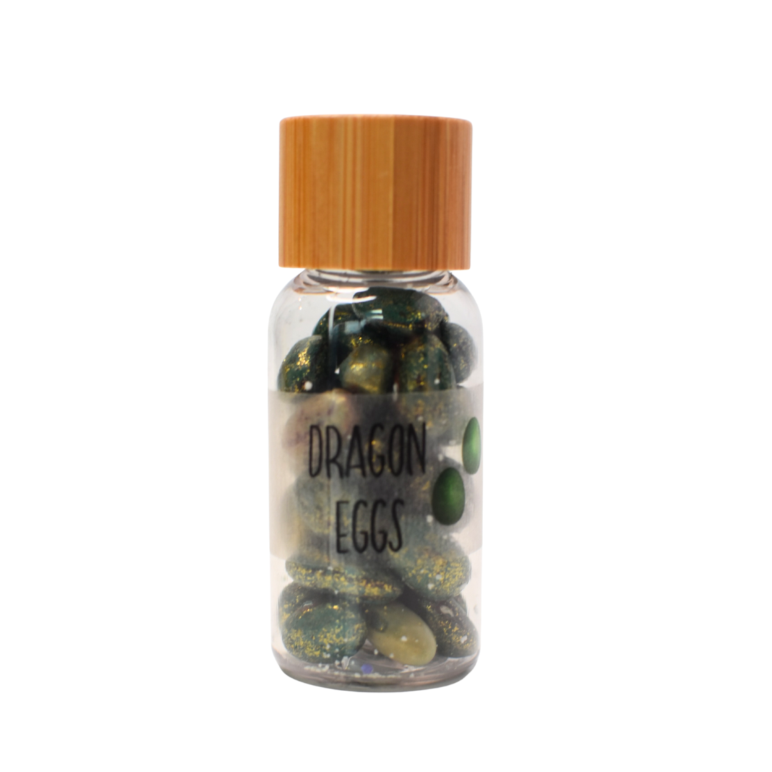 Jar labeled 'Dragon Eggs' with a wooden lid on a white background