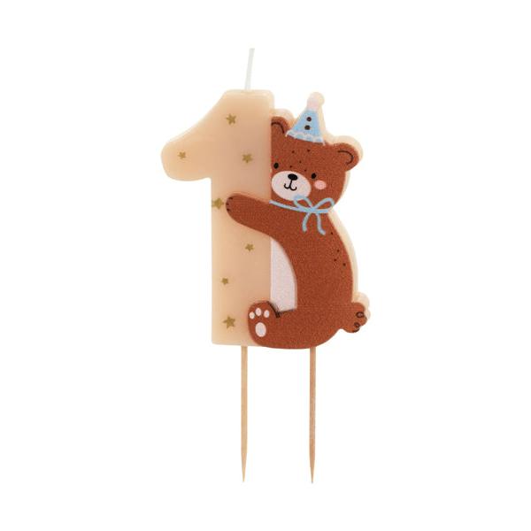 A novelty birthday candle shaped like the number 1, featuring a brown teddy bear hugging it from the side. The candle has a light beige body with small gold stars, a blue party hat, and two wooden wicks.